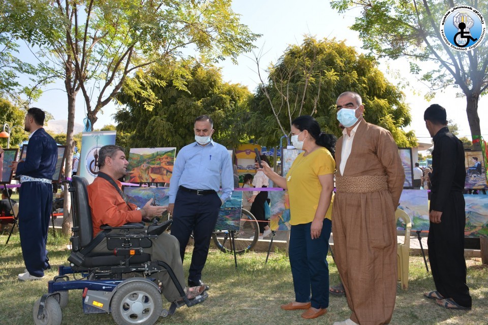 Art exhibition of Two Photographers and two Artists with disabilities in Autumn and Pomegranate Festival in Halabja